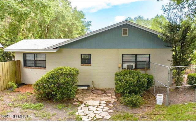 view of home's exterior featuring a patio area and cooling unit