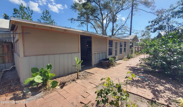 rear view of house with a patio area