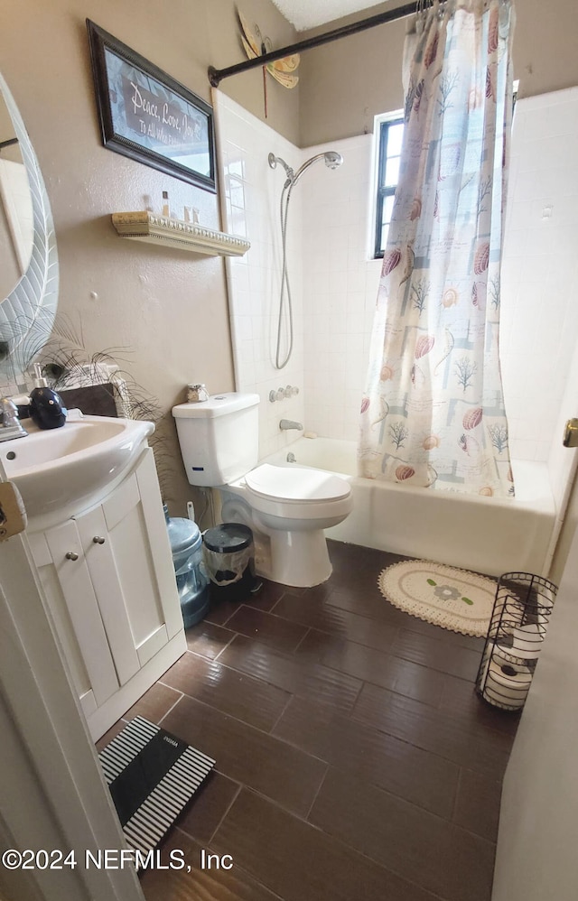 full bathroom featuring vanity, shower / bath combo, and toilet