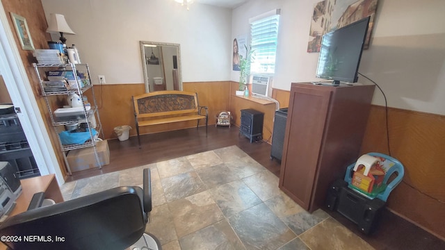 bathroom with wood walls