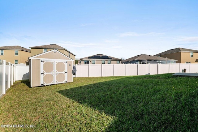 view of yard with a storage shed