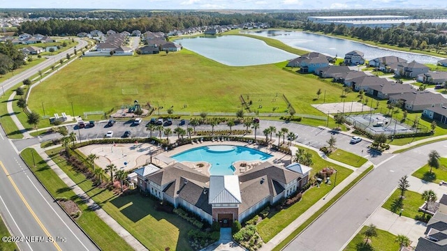 drone / aerial view with a water view