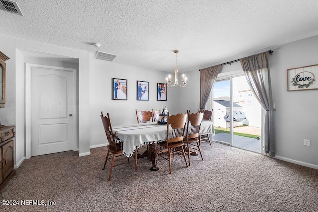 carpeted dining space with a textured ceiling and a chandelier