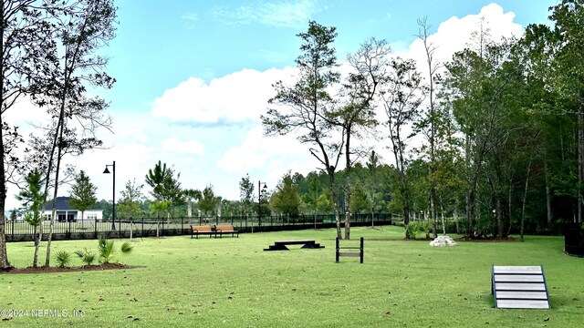 view of community featuring a yard