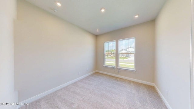 345 Palomar Dr, Saint Johns, FL 32259 - unfurnished room featuring light colored carpet, recessed lighting, and a smoke detector