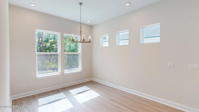 345 Palomar Dr, Saint Johns, FL 32259 - spare room featuring light wood-style floors, a chandelier, and recessed lighting