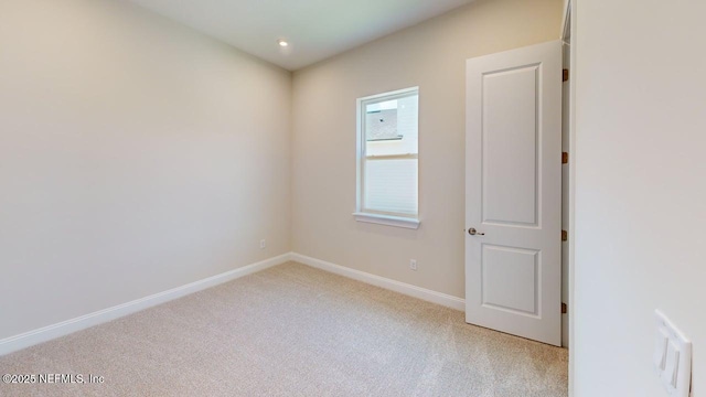 345 Palomar Dr, Saint Johns, FL 32259 - unfurnished room featuring light carpet and baseboards