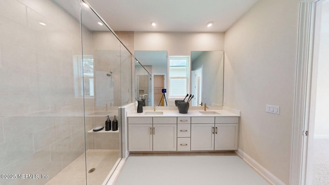 345 Palomar Dr, Saint Johns, FL 32259 - bathroom with double vanity, a shower stall, and recessed lighting