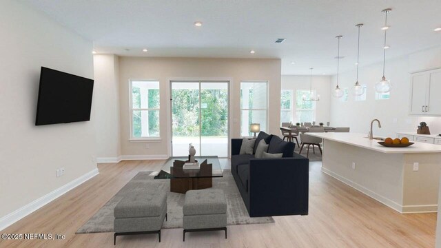 345 Palomar Dr, Saint Johns, FL 32259 - living room with light wood-type flooring and recessed lighting