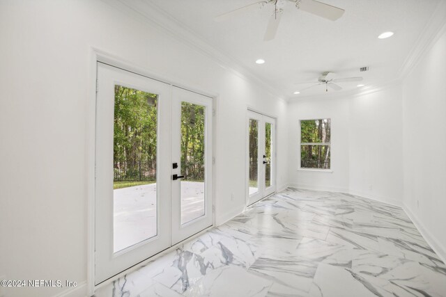 2693 Seneca Dr, Saint Johns, FL 32259 - spare room featuring french doors, recessed lighting, ceiling fan, ornamental molding, and marble look tiles