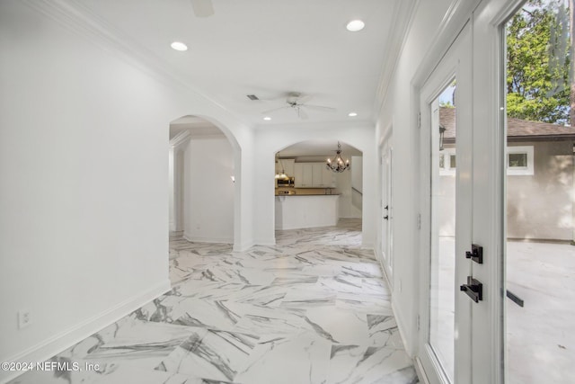 2693 Seneca Dr, Saint Johns, FL 32259 - corridor featuring arched walkways, recessed lighting, baseboards, a chandelier, and crown molding