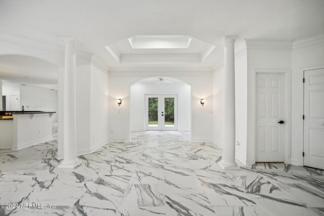 2693 Seneca Dr, Saint Johns, FL 32259 - hall with french doors, arched walkways, a raised ceiling, baseboards, and marble finish floors