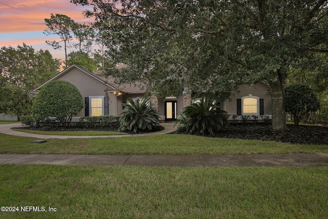 2693 Seneca Dr, Saint Johns, FL 32259 - view of property hidden behind natural elements with stucco siding and a front yard
