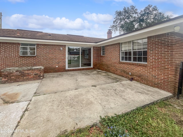 rear view of property with a patio