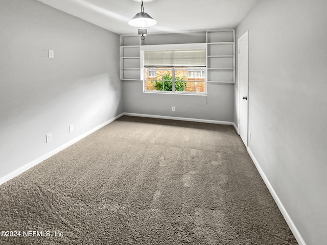 empty room featuring carpet floors