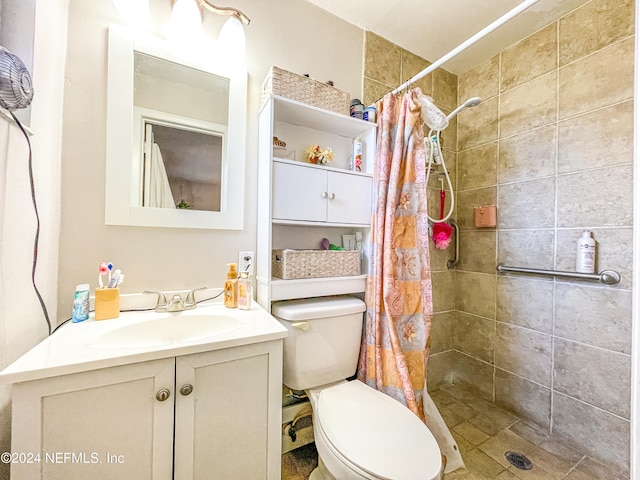 bathroom featuring vanity, toilet, and a shower with shower curtain