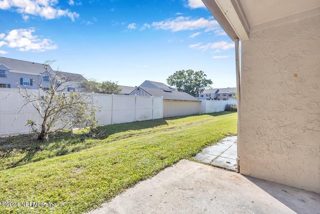 8300 Plaza Gate Ln Unit 1183, Jacksonville, FL 32217 - view of yard featuring a patio and a residential view