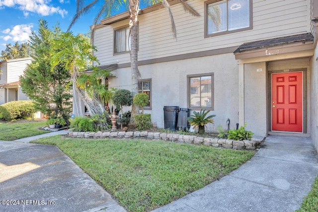 exterior space featuring a front lawn