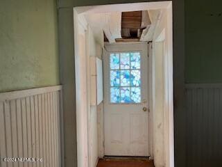 doorway featuring radiator heating unit