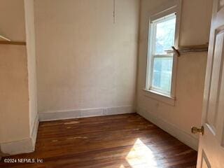 interior space with dark hardwood / wood-style flooring