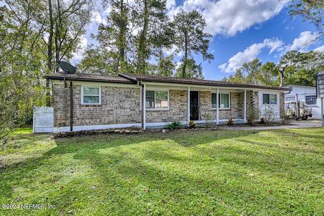 ranch-style house with a front yard