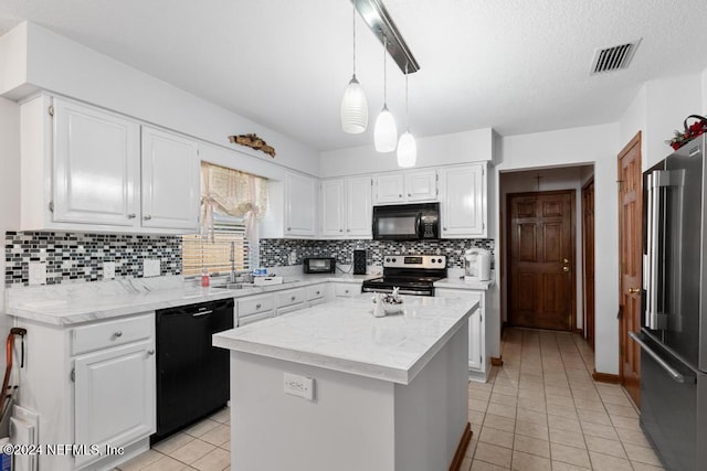 kitchen featuring backsplash, white cabinetry, black appliances, and a kitchen island