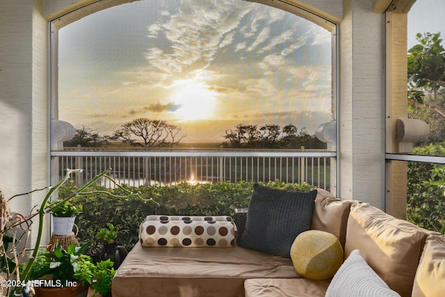 view of balcony at dusk