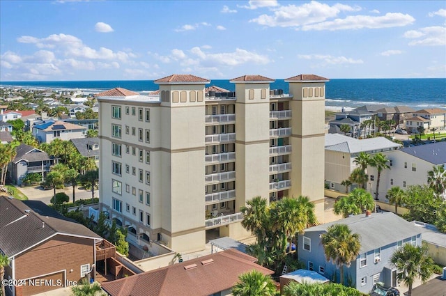 view of building exterior featuring a water view