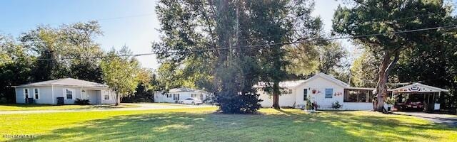 477 Susie Ct, Macclenny, FL 32063 - view of front facade featuring a front yard