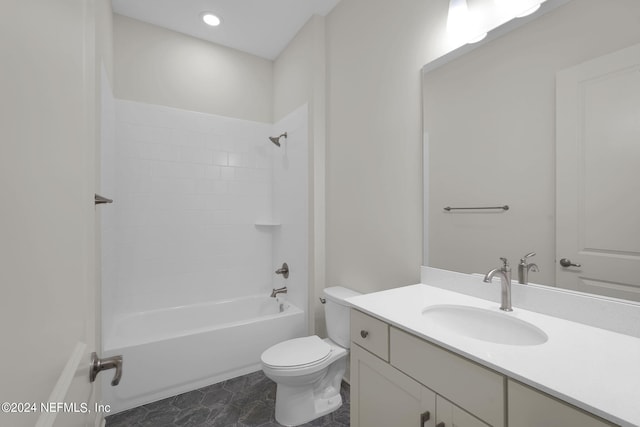 full bathroom with vanity, shower / tub combination, and toilet