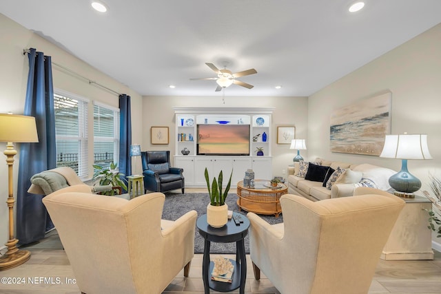 living room with ceiling fan