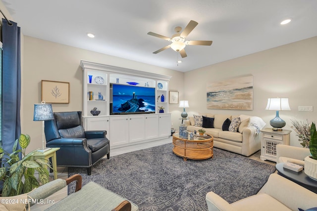 living room featuring ceiling fan