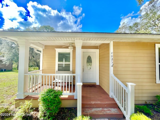 property entrance featuring covered porch