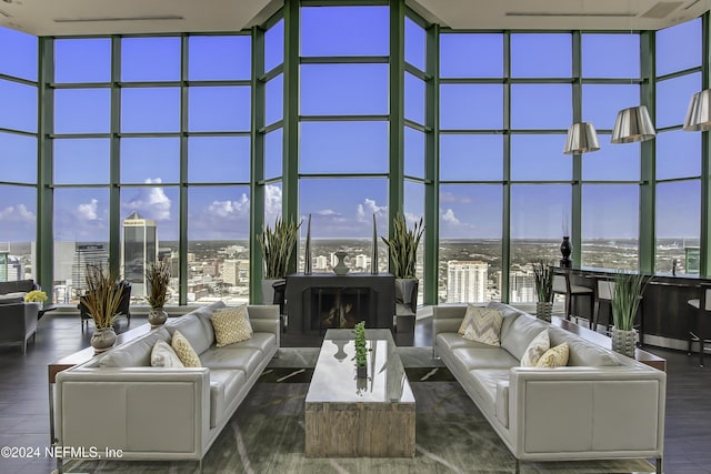 1431 Riverplace Blvd Unit 2602, Jacksonville, FL 32207 - living room with floor to ceiling windows, wood finished floors, a towering ceiling, and plenty of natural light