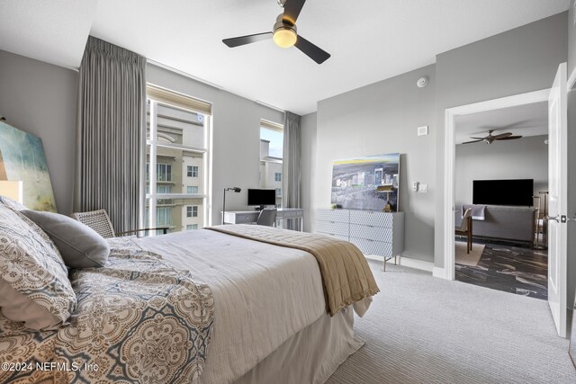 1431 Riverplace Blvd Unit 2602, Jacksonville, FL 32207 - bedroom featuring carpet flooring and ceiling fan