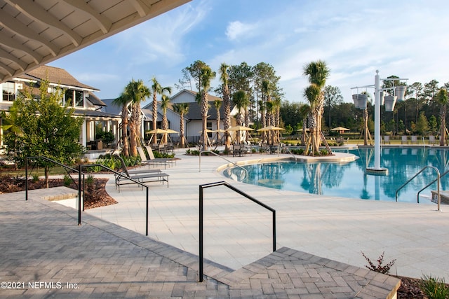 view of swimming pool featuring a patio