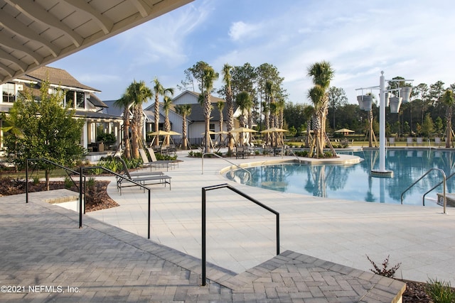 63 Bird Watch Ct, Saint Augustine, FL 32092 - community pool featuring a patio