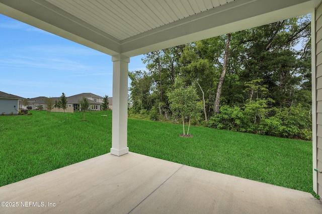 63 Bird Watch Ct, Saint Augustine, FL 32092 - view of green lawn with a patio area