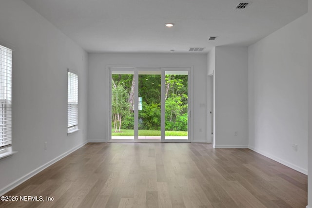 63 Bird Watch Ct, Saint Augustine, FL 32092 - empty room with wood finished floors and baseboards