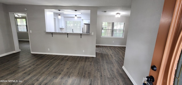 interior space featuring dark hardwood / wood-style flooring