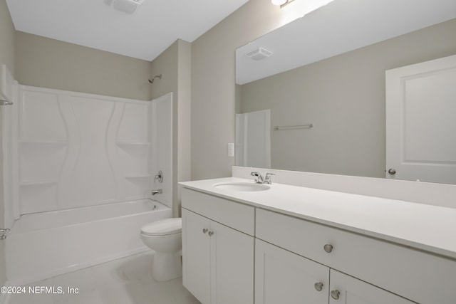 full bathroom featuring vanity, toilet, and bathtub / shower combination