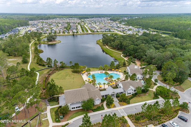 drone / aerial view with a water view