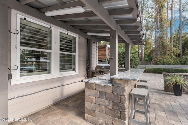 10225 Russell Sampson Rd, Saint Johns, FL 32259 - view of patio / terrace featuring area for grilling and an outdoor kitchen