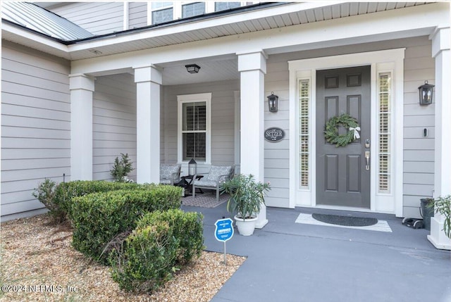 10225 Russell Sampson Rd, Saint Johns, FL 32259 - doorway to property featuring a porch