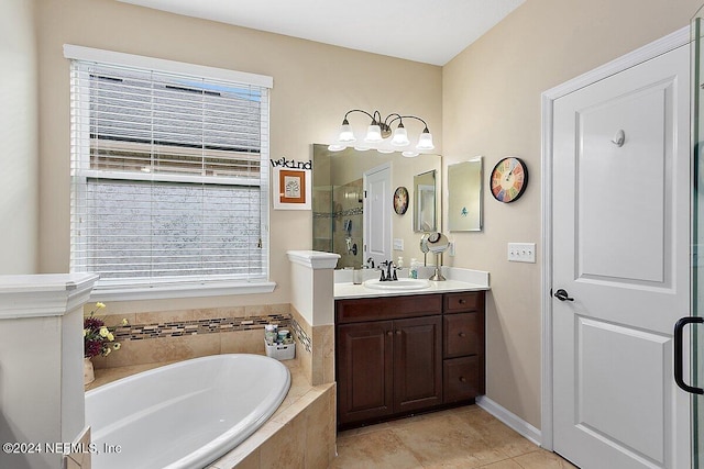 bathroom featuring vanity, shower with separate bathtub, and tile patterned flooring