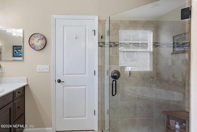 bathroom featuring vanity and walk in shower