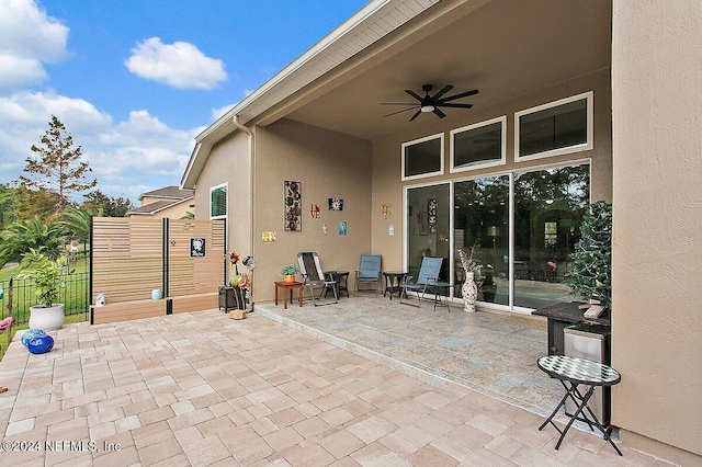 view of patio / terrace featuring ceiling fan