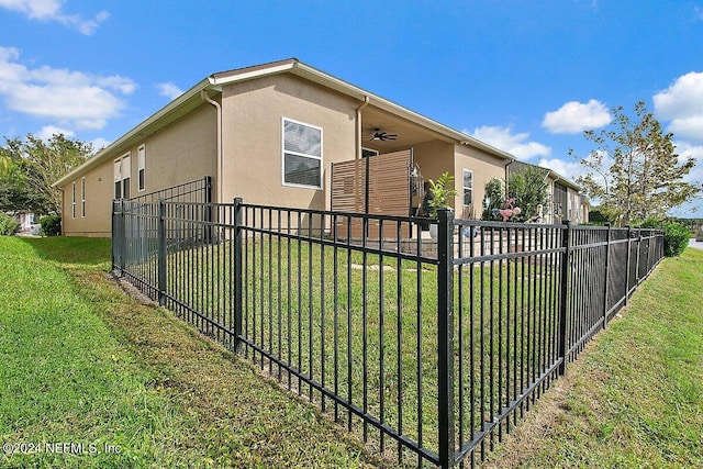 view of property exterior with a yard