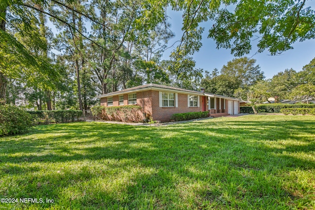 exterior space featuring a front lawn