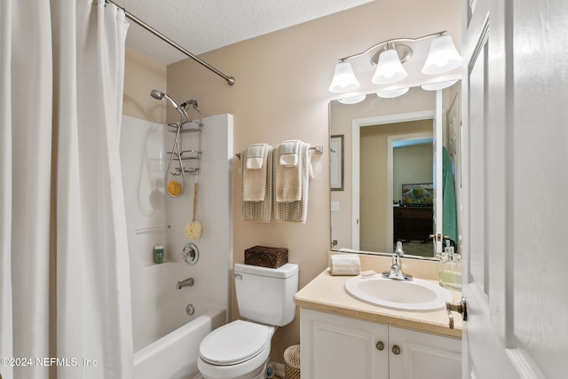 full bathroom with vanity, shower / bath combination with curtain, a textured ceiling, and toilet